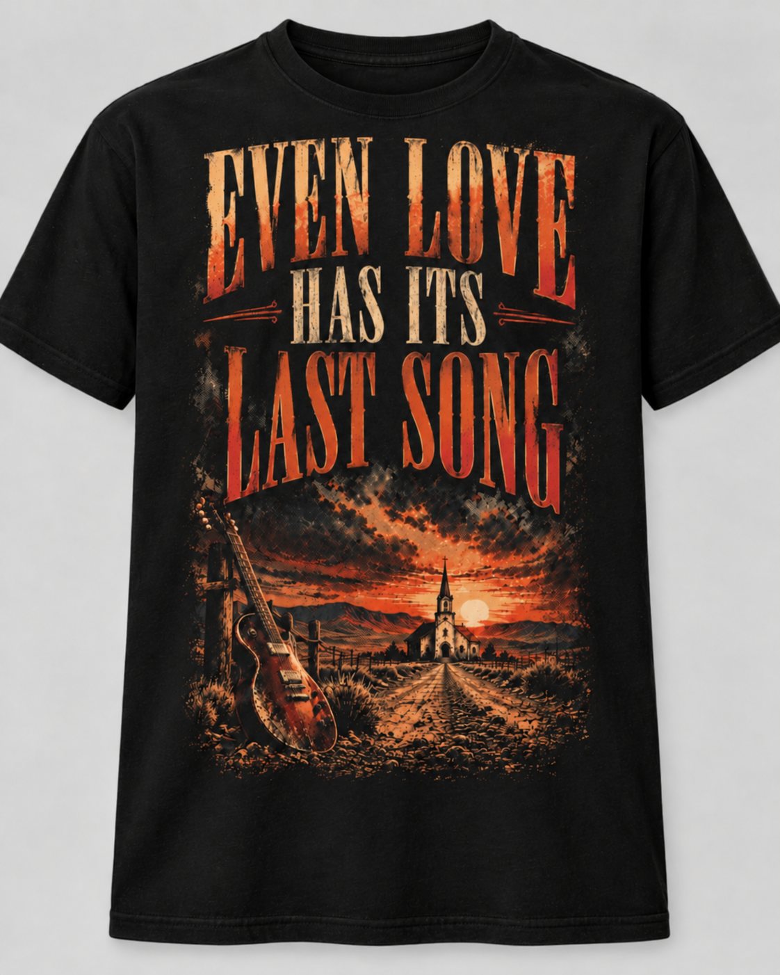 Camiseta negra con ilustración western de atardecer y el texto Even Love Has Its Last Song